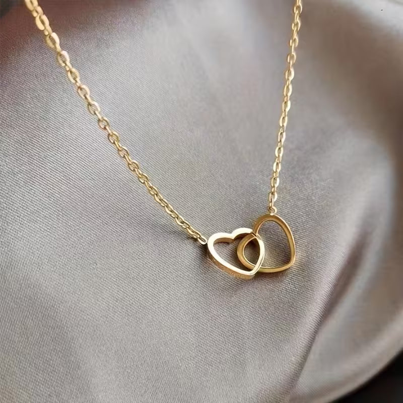 Interlocking Hearts Necklace - Gold & Silver